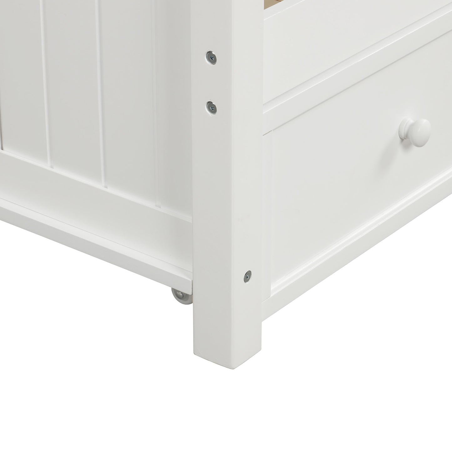 White wooden bed frame corner with a visible drawer and knob