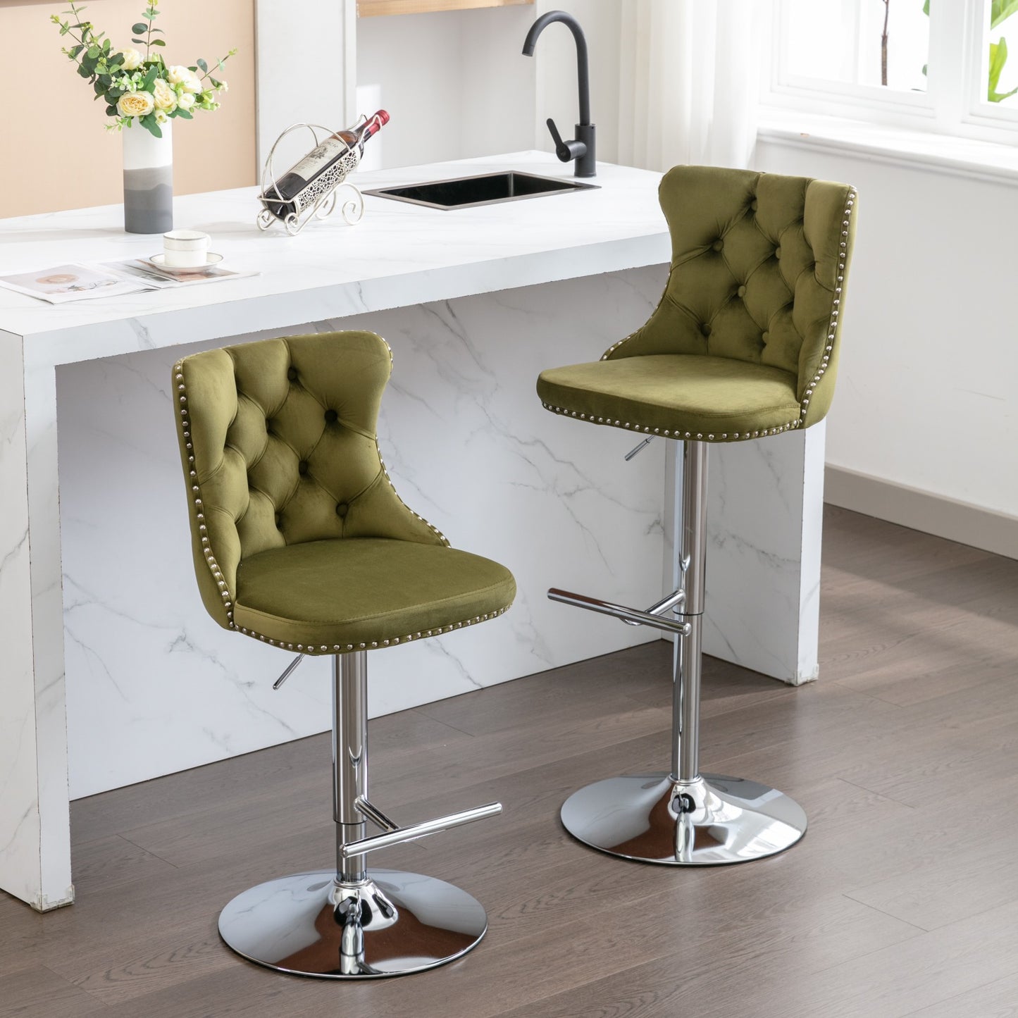 Green velvet tufted bar stool with silver nailhead trim and chrome base