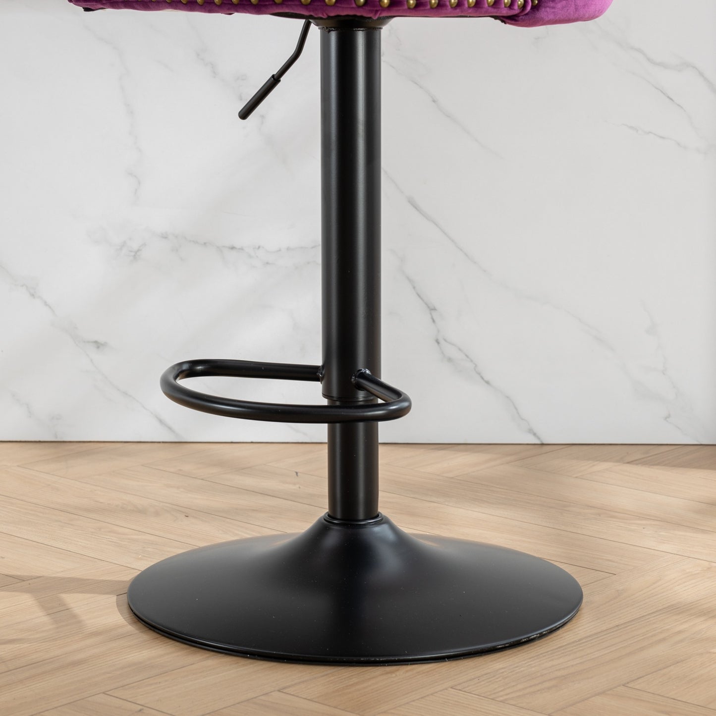 Adjustable height bar stool base with black metal finish and footrest ring