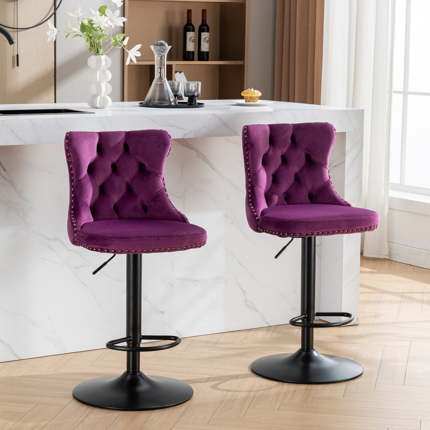 Two plush purple velvet tufted bar stools with nailhead trim featuring adjustable height and black metal bases