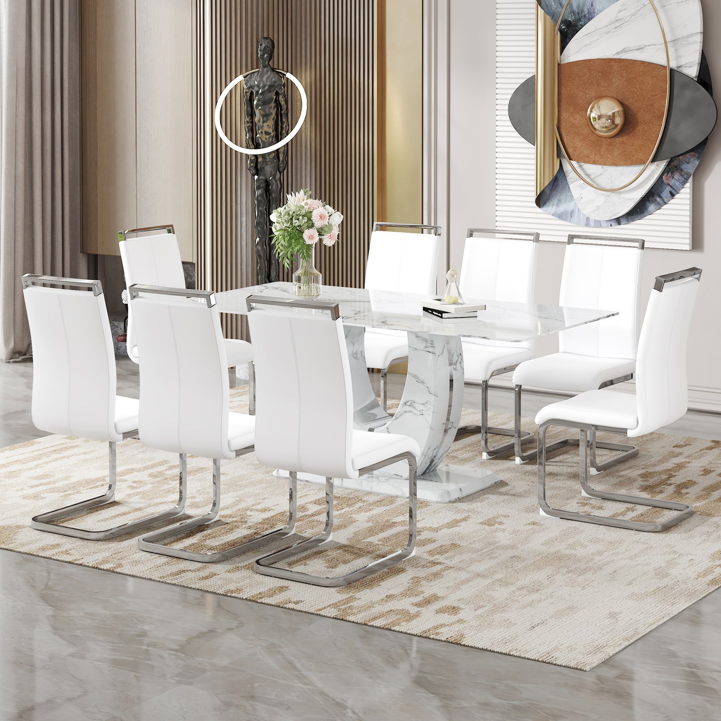 White leather dining chairs with chrome sled legs surround a marblelook dining table