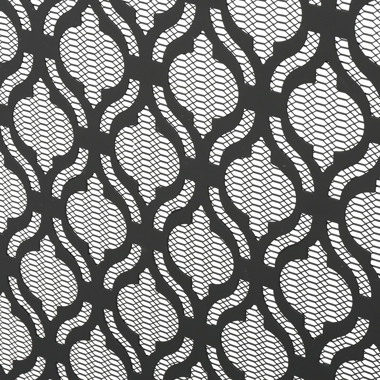 Black decorative metal screen with honeycomb pattern