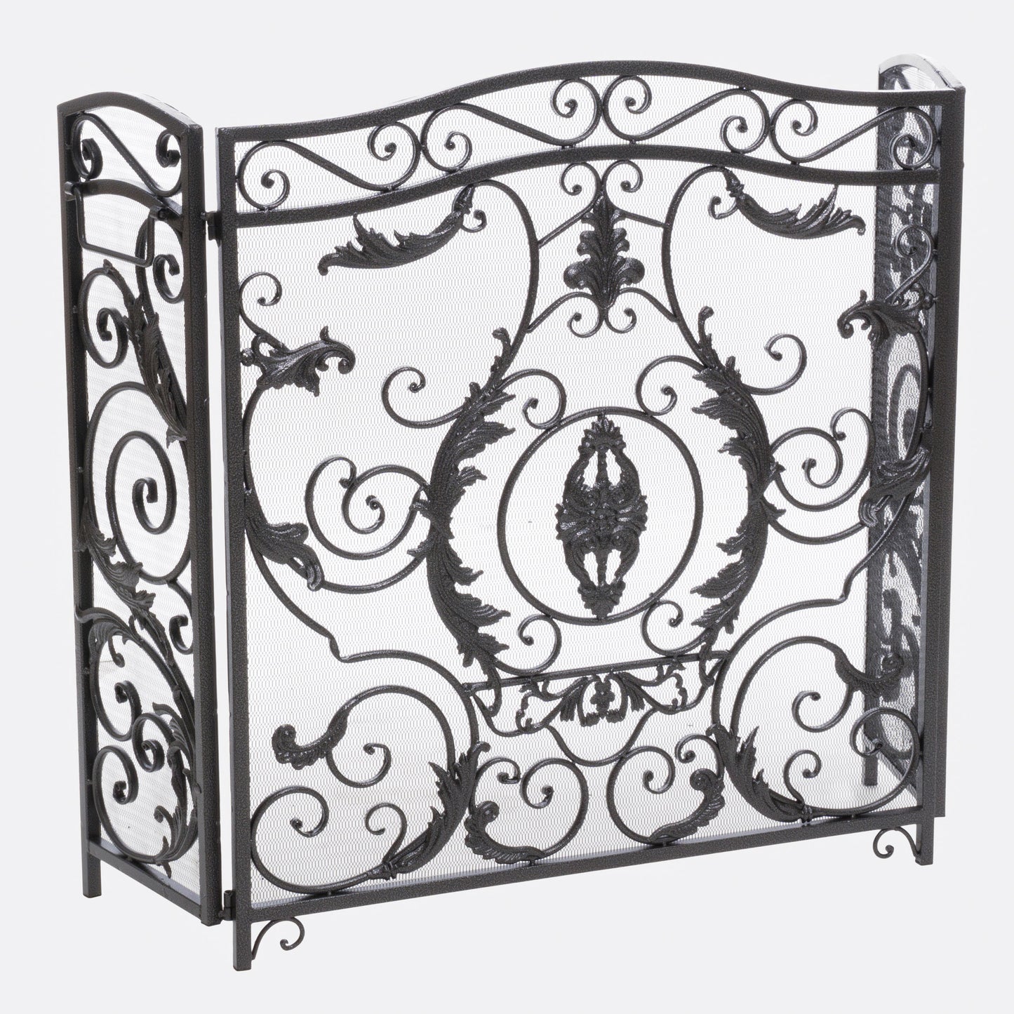 Black metal fireplace screen with ornate scrollwork and leaf motifs