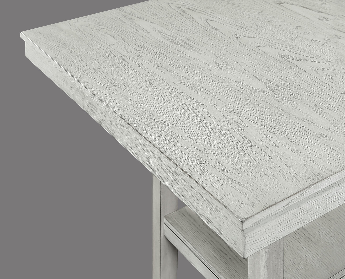 Closeup of whitewashed wood grain on a dining table top