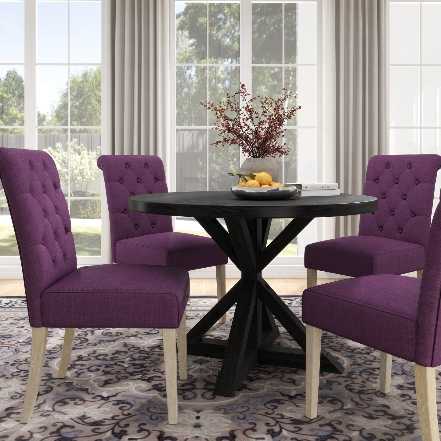 Tufted purple dining chairs surrounding a dark wood round table