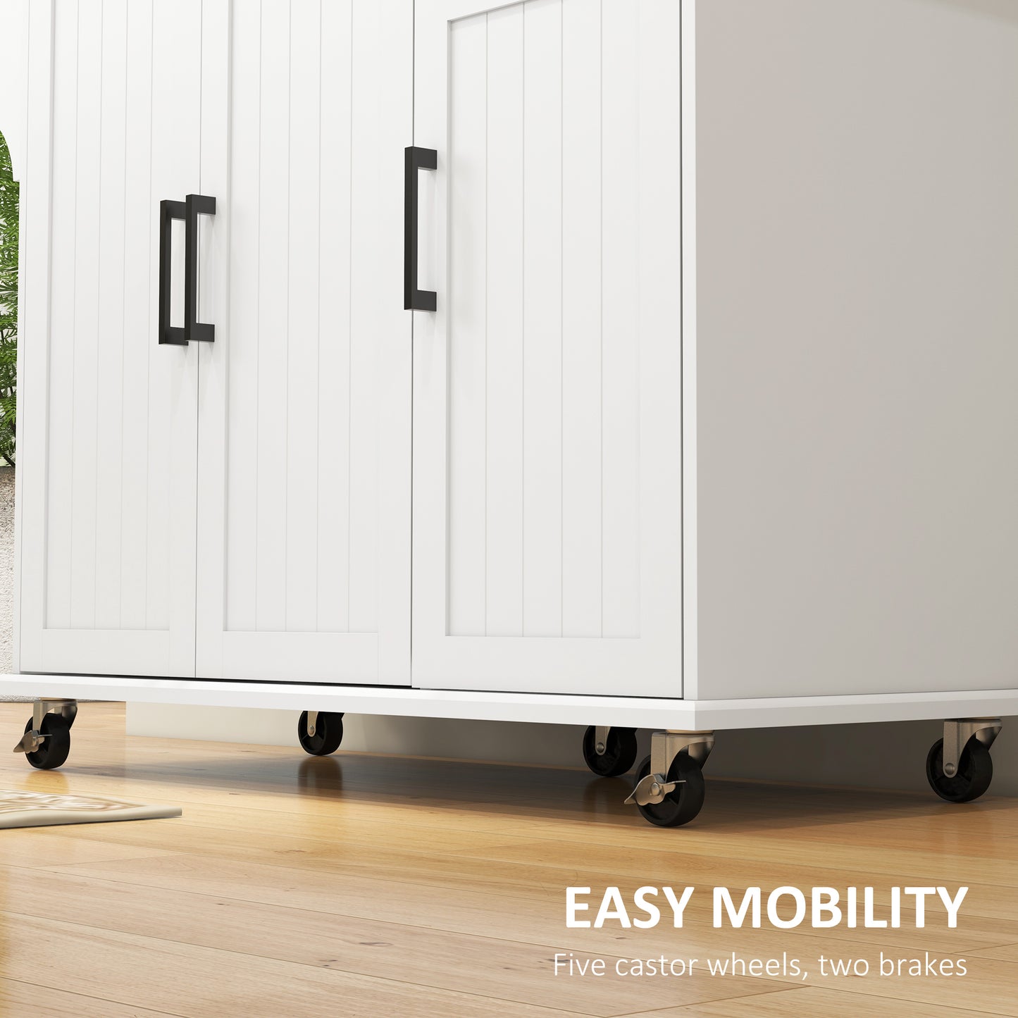 White storage cabinet with black modern handles and five castor wheels two with brakes