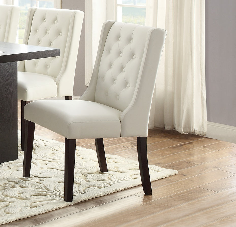 Elegant white tufted dining chair with dark wood legs
