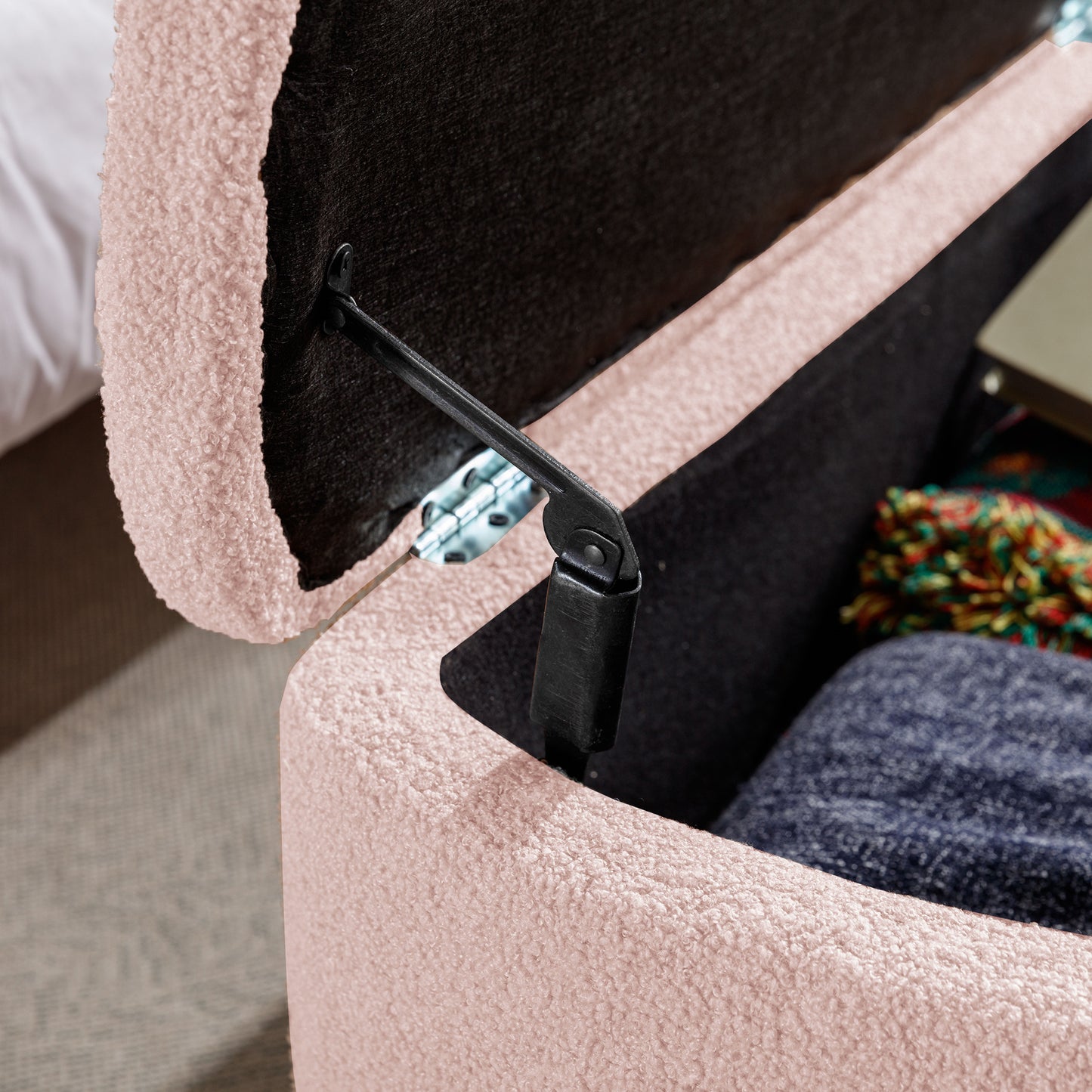 Pink teddy storage ottoman lid hinge detail