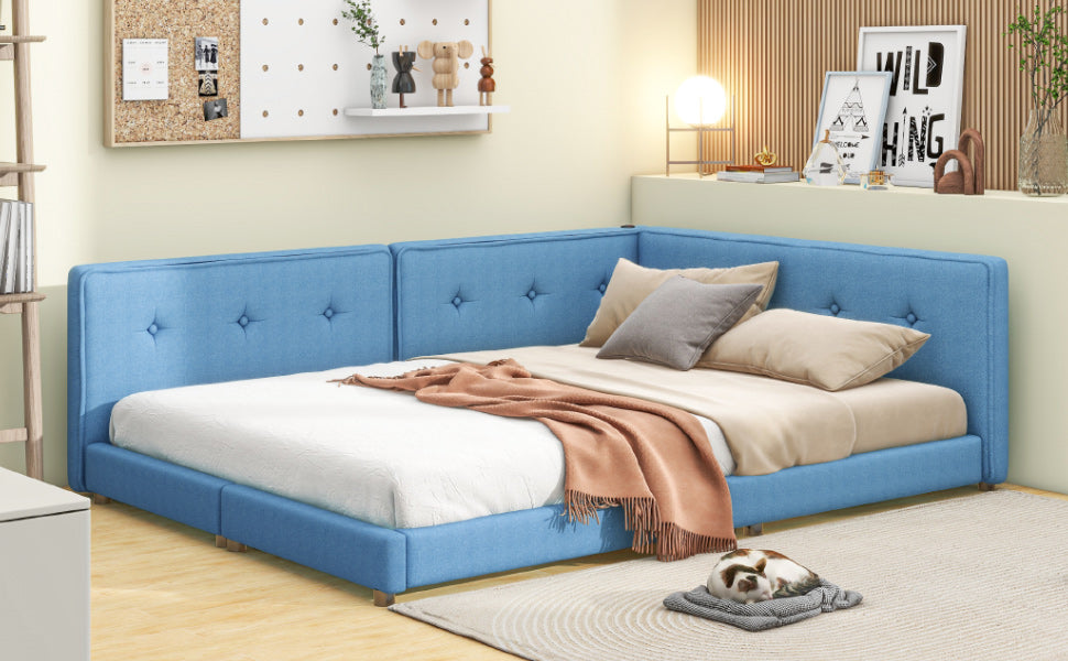 Blue upholstered sectional daybed with tufted headboard and throw blanket