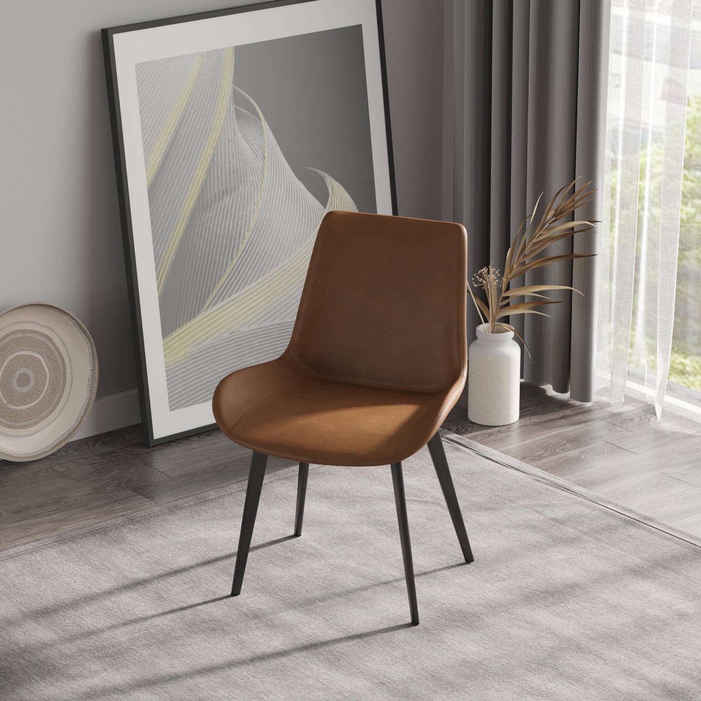 Tan vegan leather dining chair with black metal legs