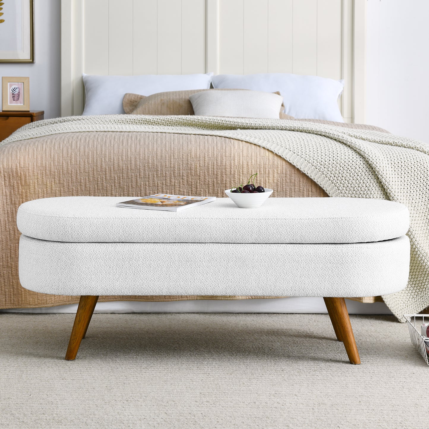 Textured white fabric storage bench with wooden legs ideal for entryway or foot of bed