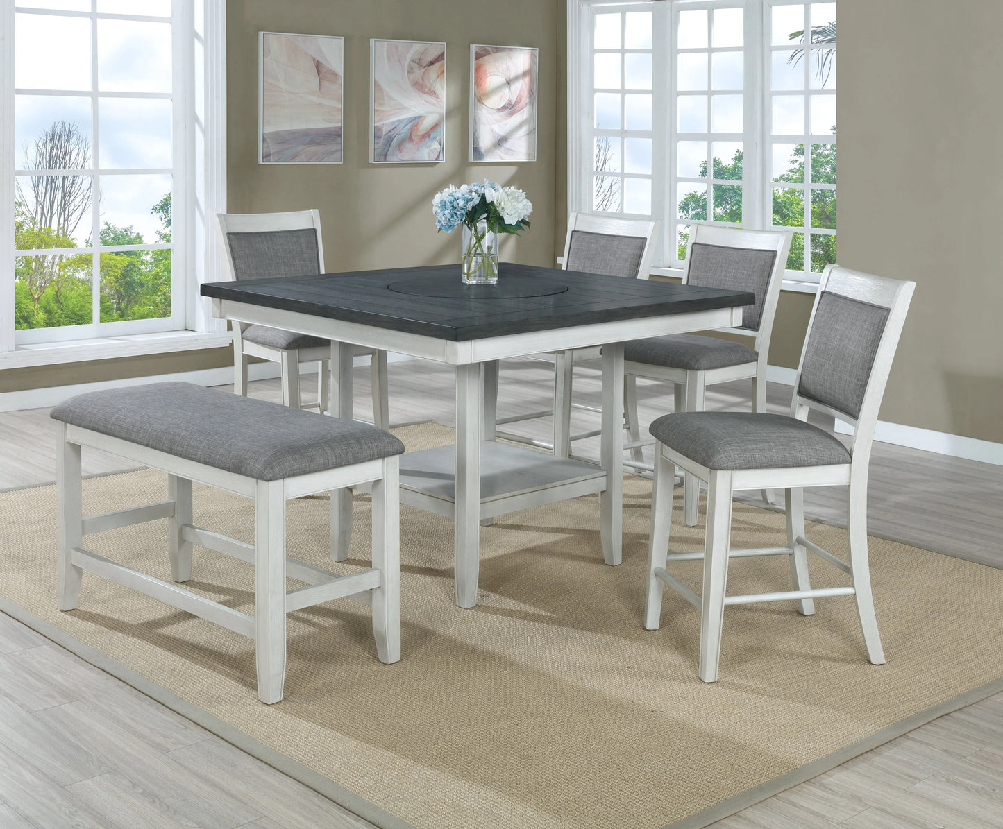 Square grey and white pub table set with upholstered seating for four