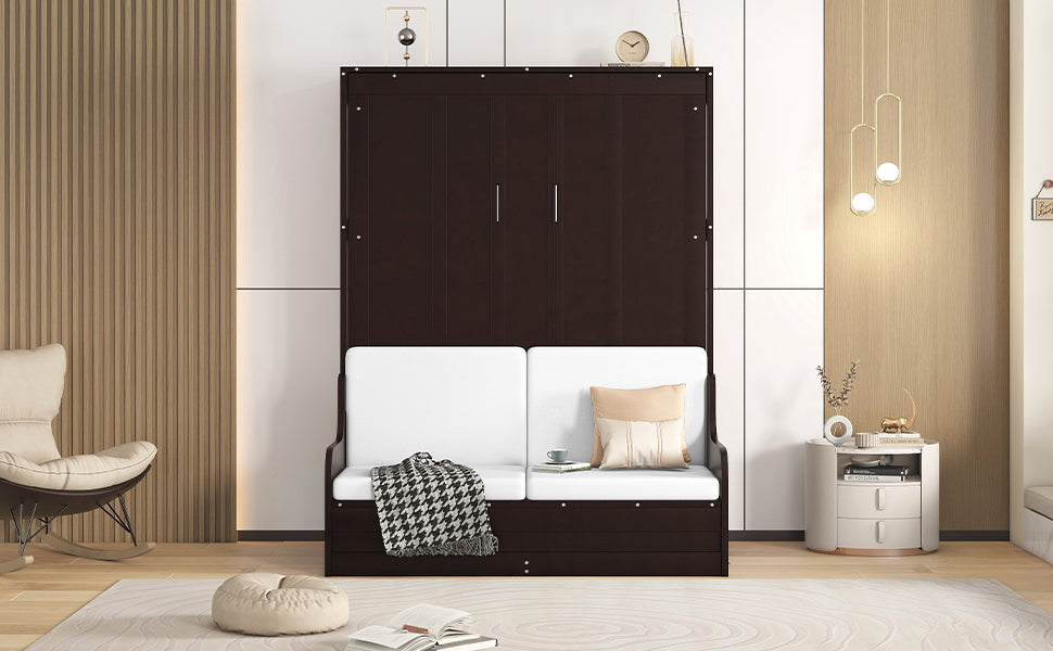 Dark brown murphy bed with white sofa cushions and black and white throw