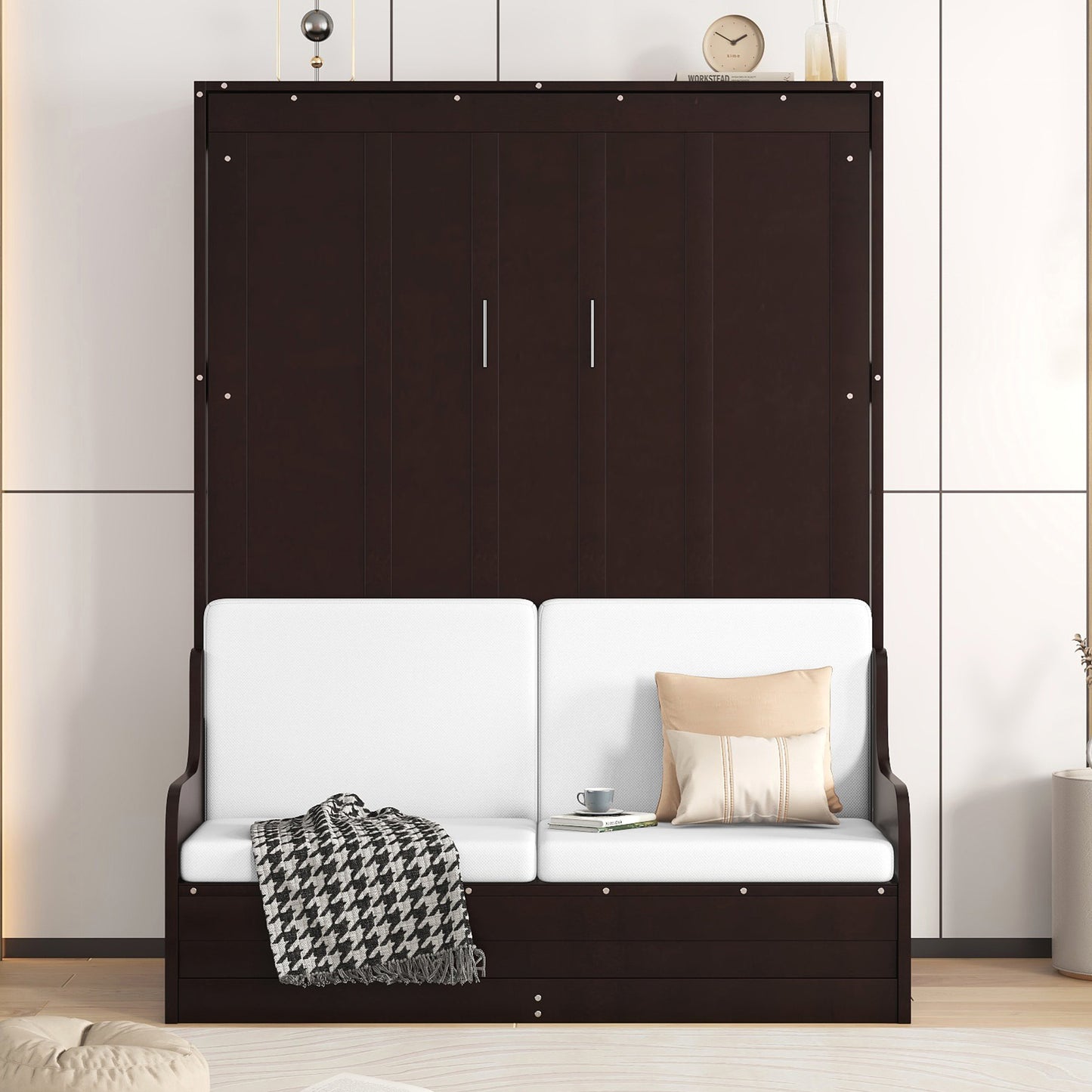 Dark brown murphy bed with white sofa cushions houndstooth throw and accent pillow