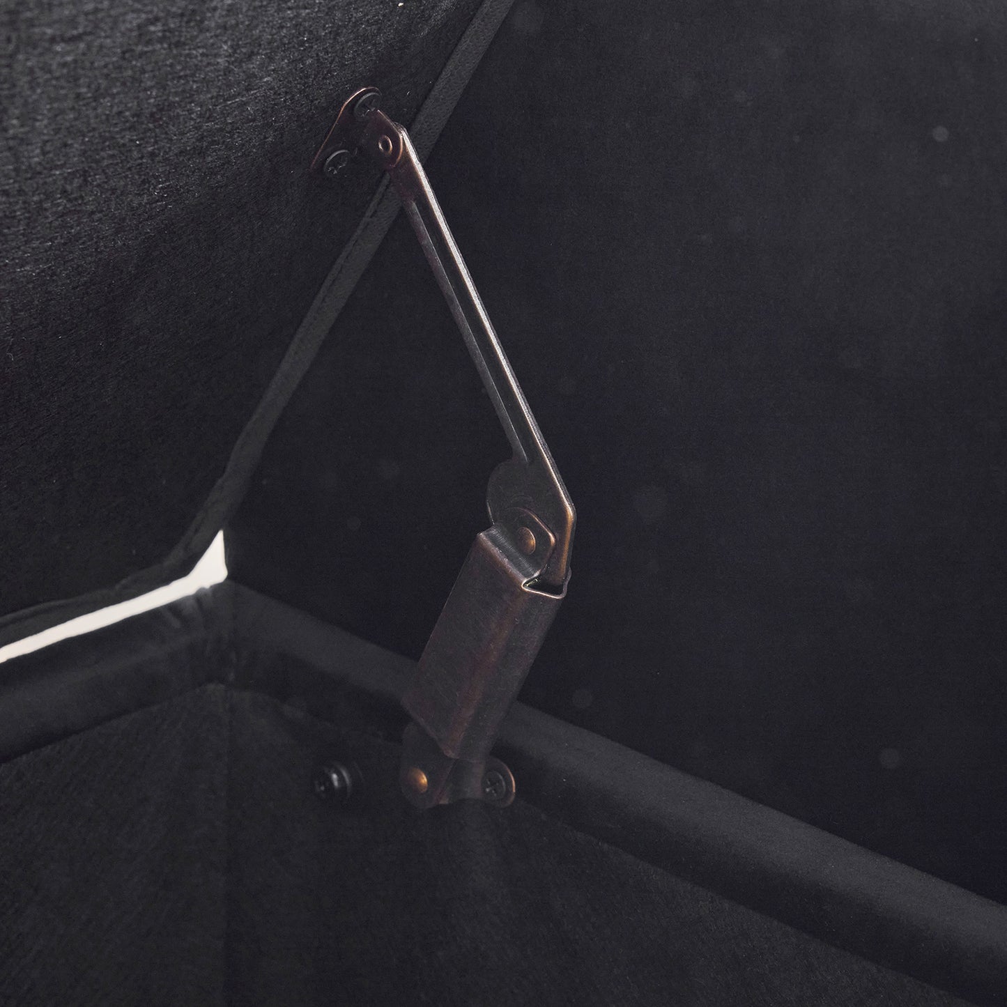 Black ottoman hinge mechanism detail