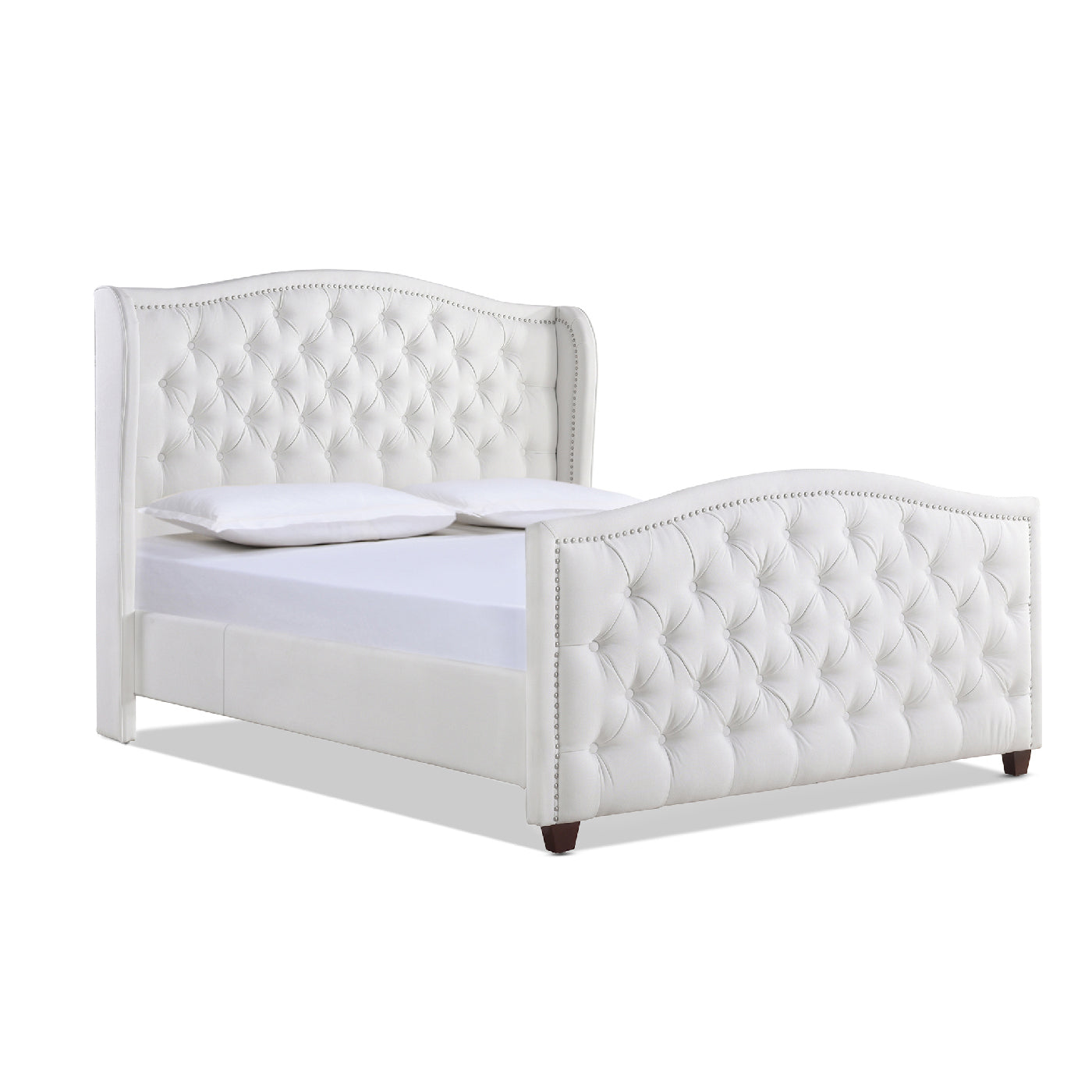 White tufted upholstered bed with silver nailhead trim