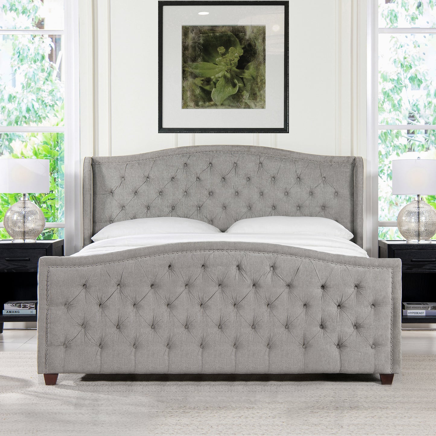 Grey tufted wingback bed with nailhead trim