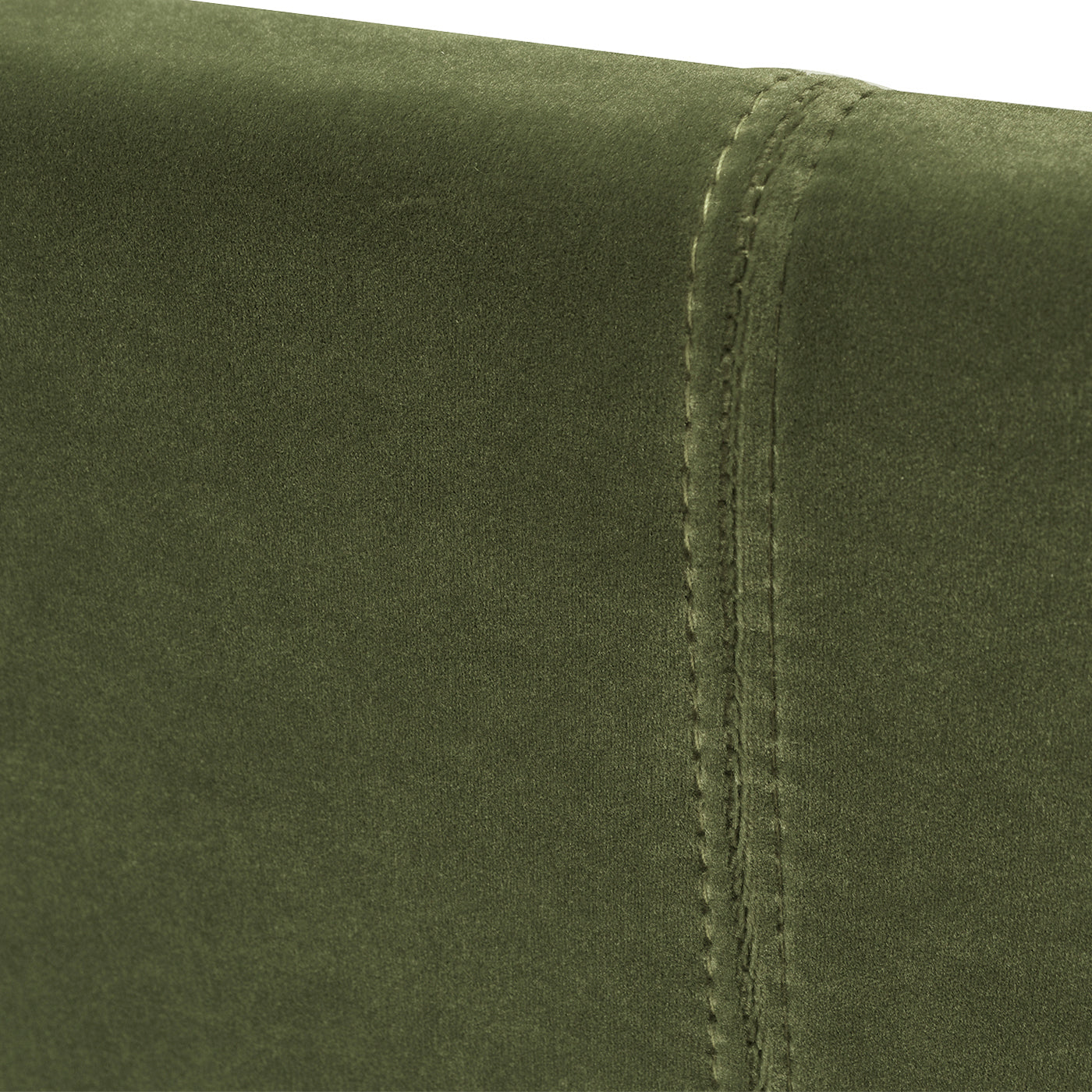 Closeup of olive green velvet fabric with stitched seam detail