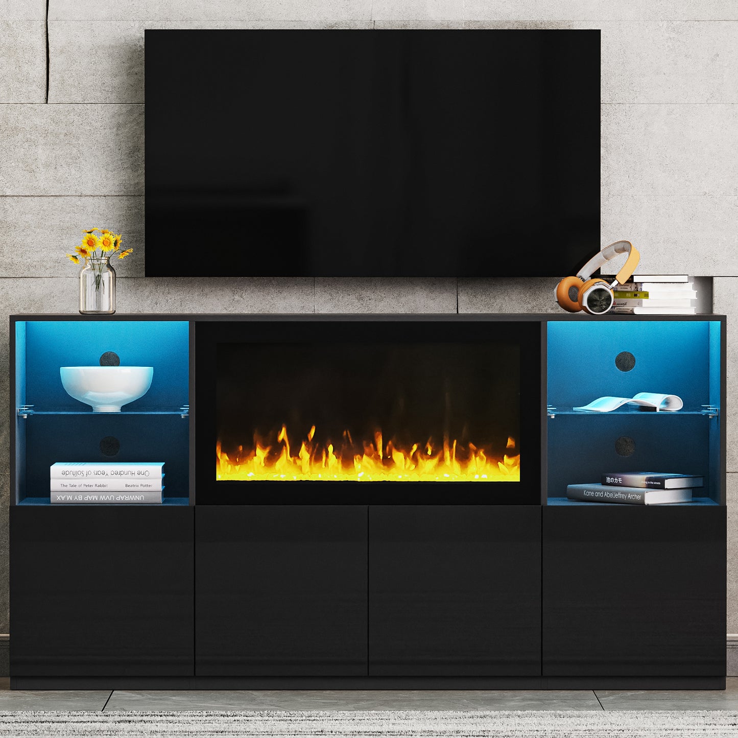 Black media console with electric fireplace and blue LED lights