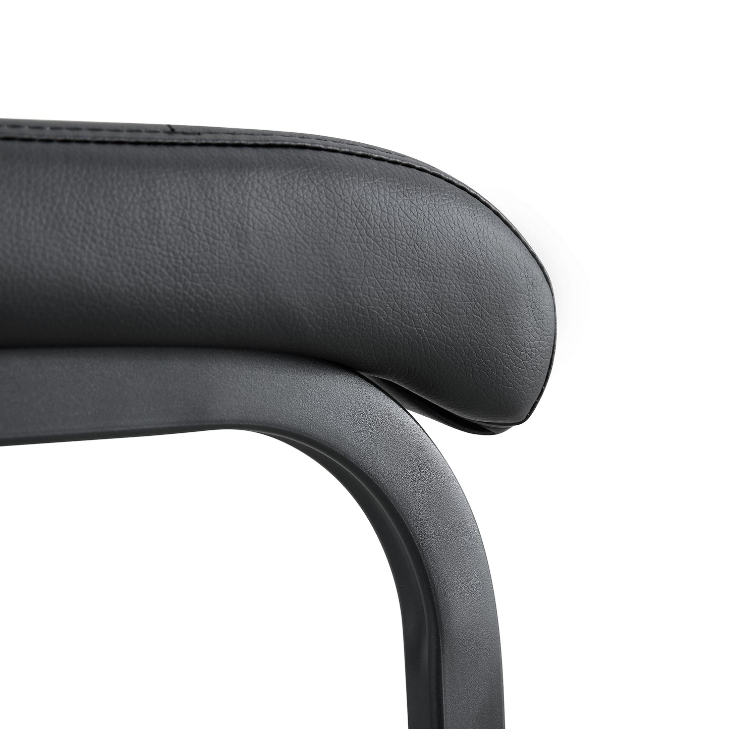 Black faux leather headrest with textured metal frame