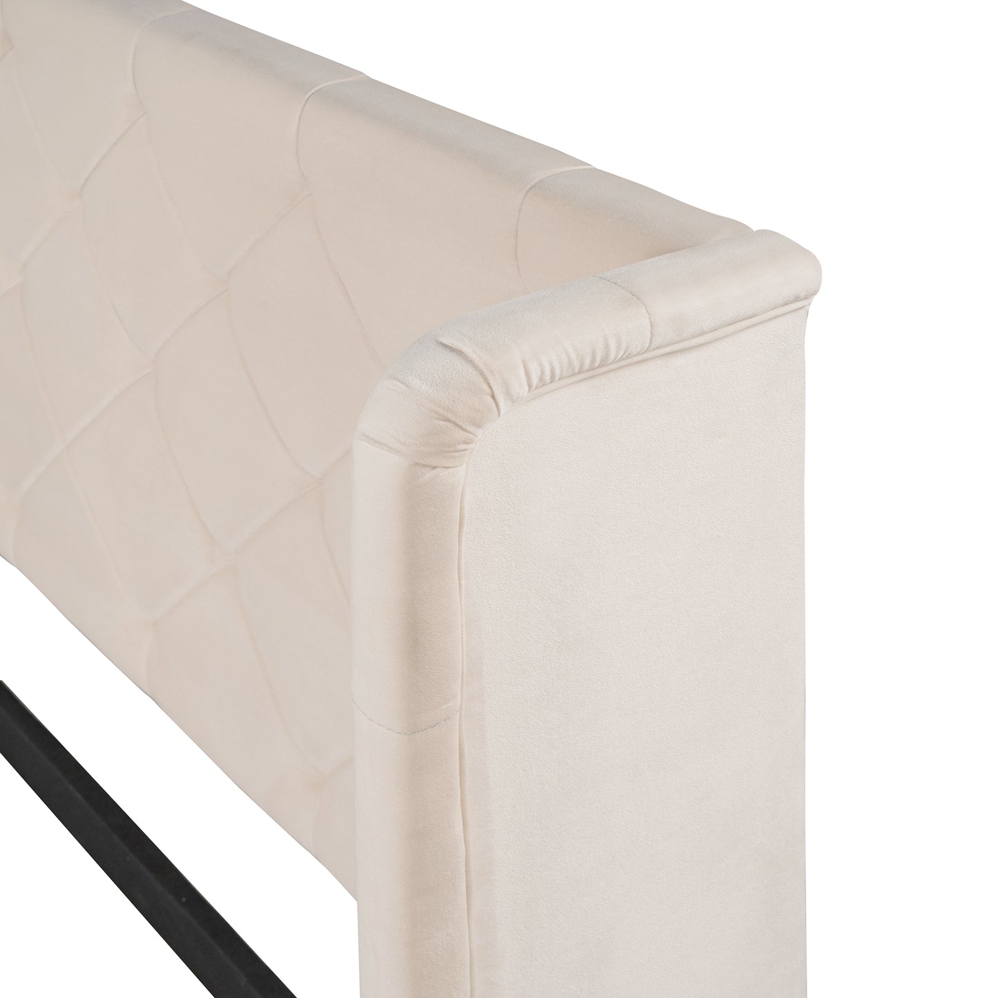 Cream upholstered tufted headboard with curved edges on a black metal frame