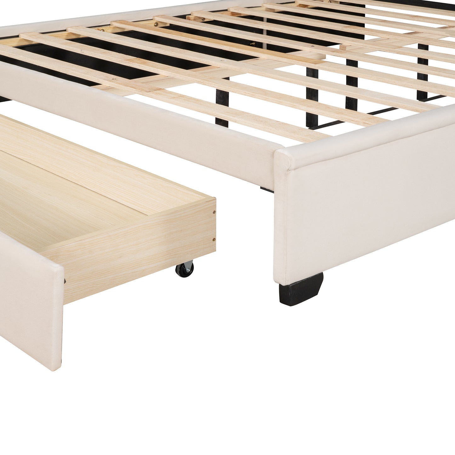 Cream upholstered bed frame with wooden slats and an open pullout drawer on wheels
