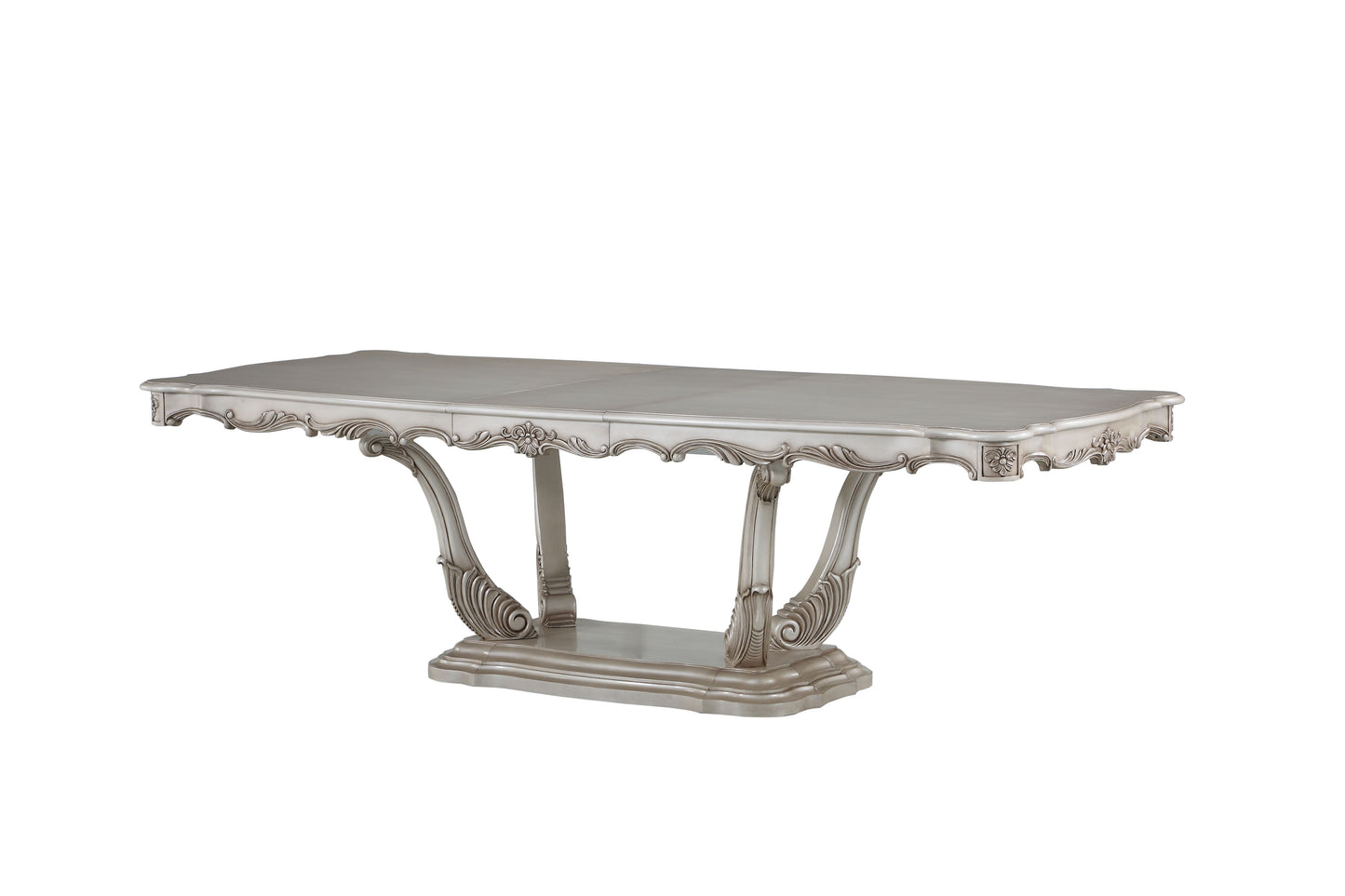 Elegant silver dining table with ornate scrollwork legs
