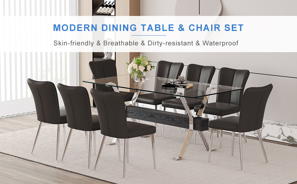 Modern glass top dining table with eight dark brown faux leather chairs