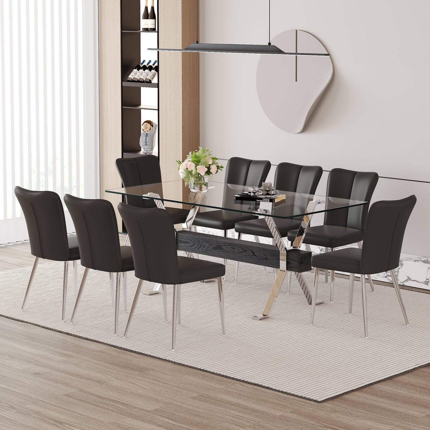 Modern glass dining table with eight black upholstered chairs and chrome legs