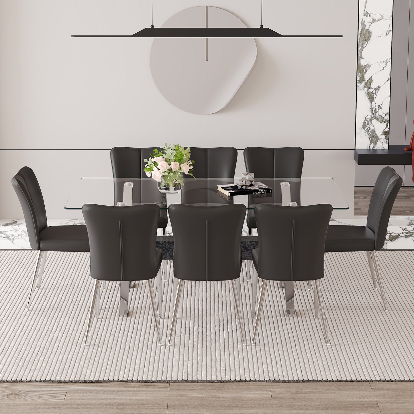 Elegant glass top dining table with eight dark grey upholstered chairs