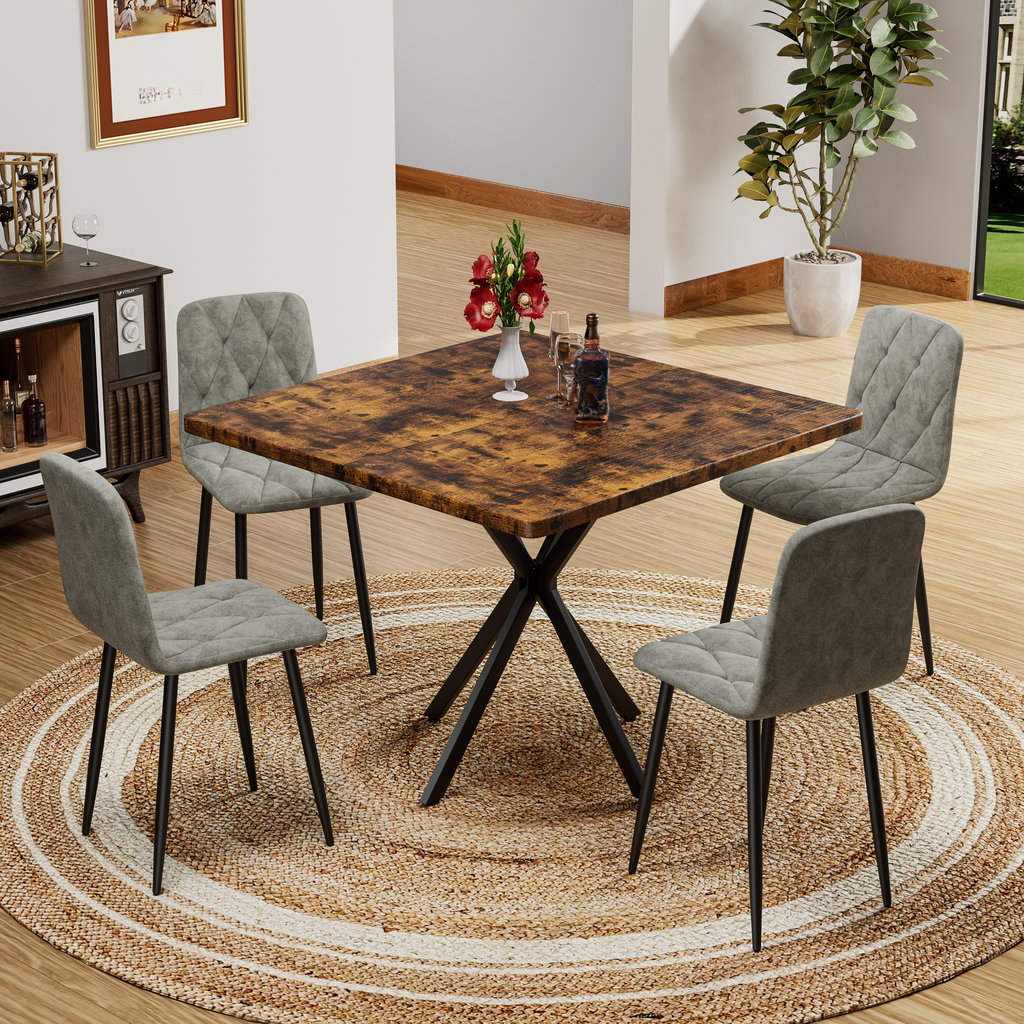 Rustic wood dining table with grey upholstered chairs
