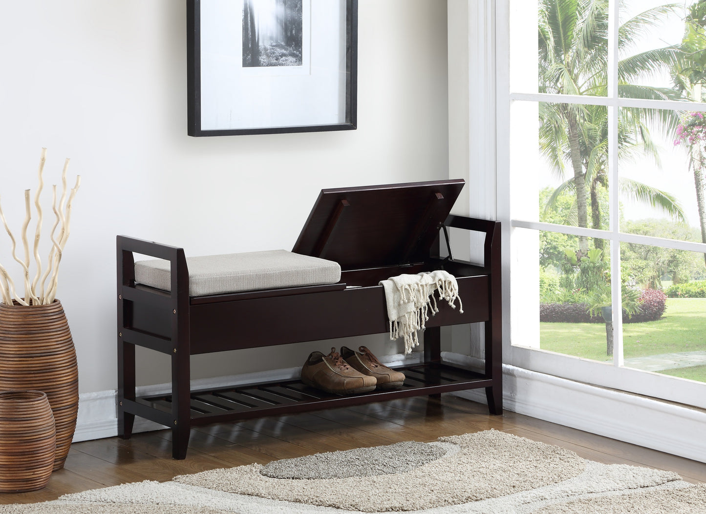 Dark brown wood storage bench with a light beige upholstered seat and shoe rack