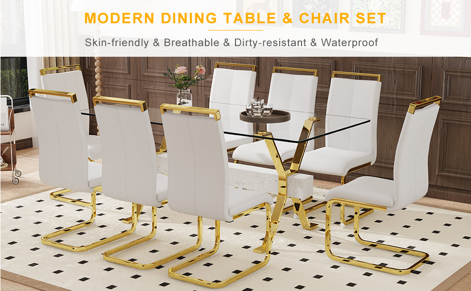 White upholstered dining chairs with gold legs around a glasstop dining table