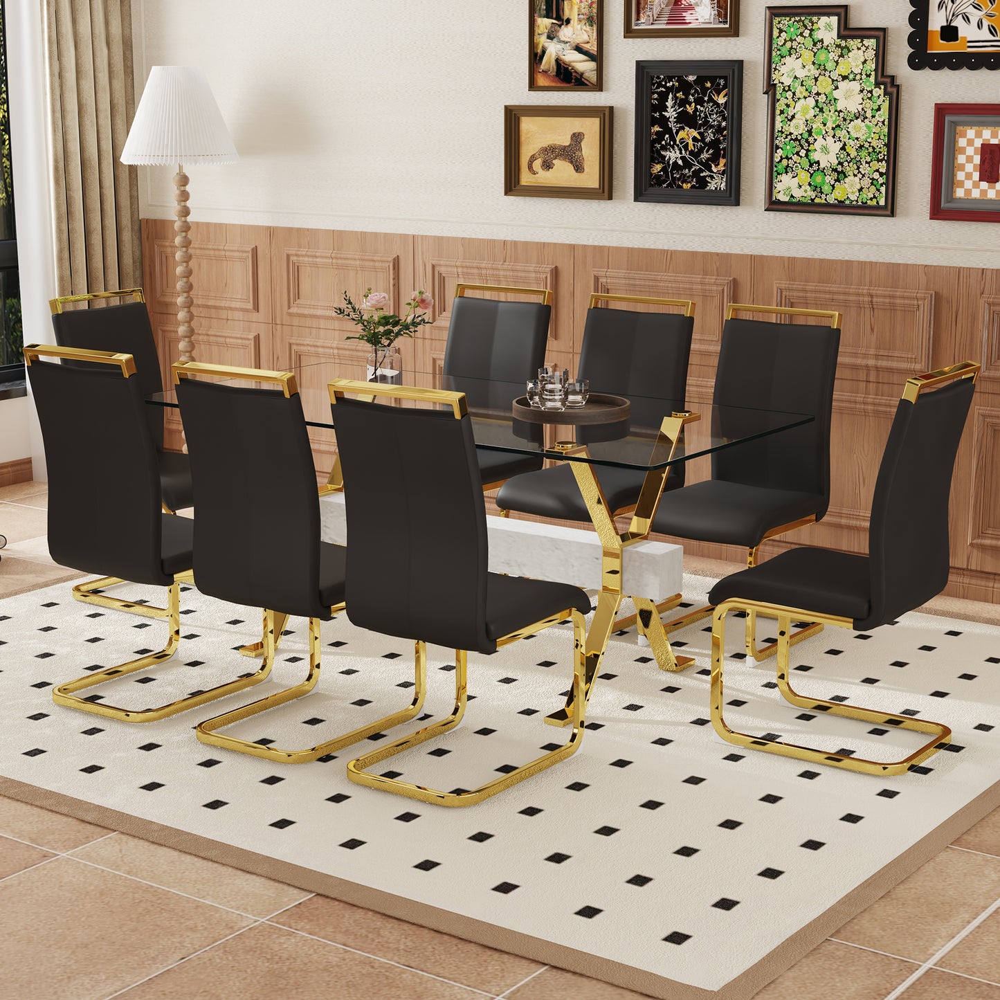 Black leather dining chairs with gold legs