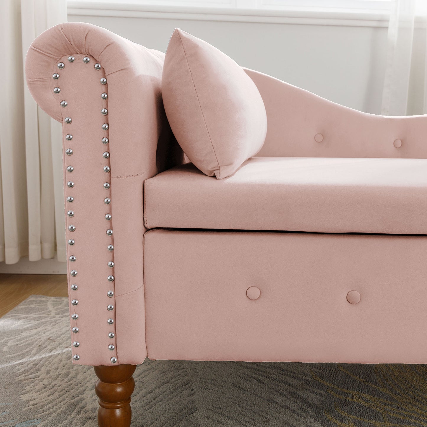 Pink velvet chaise lounge with silver nailhead trim