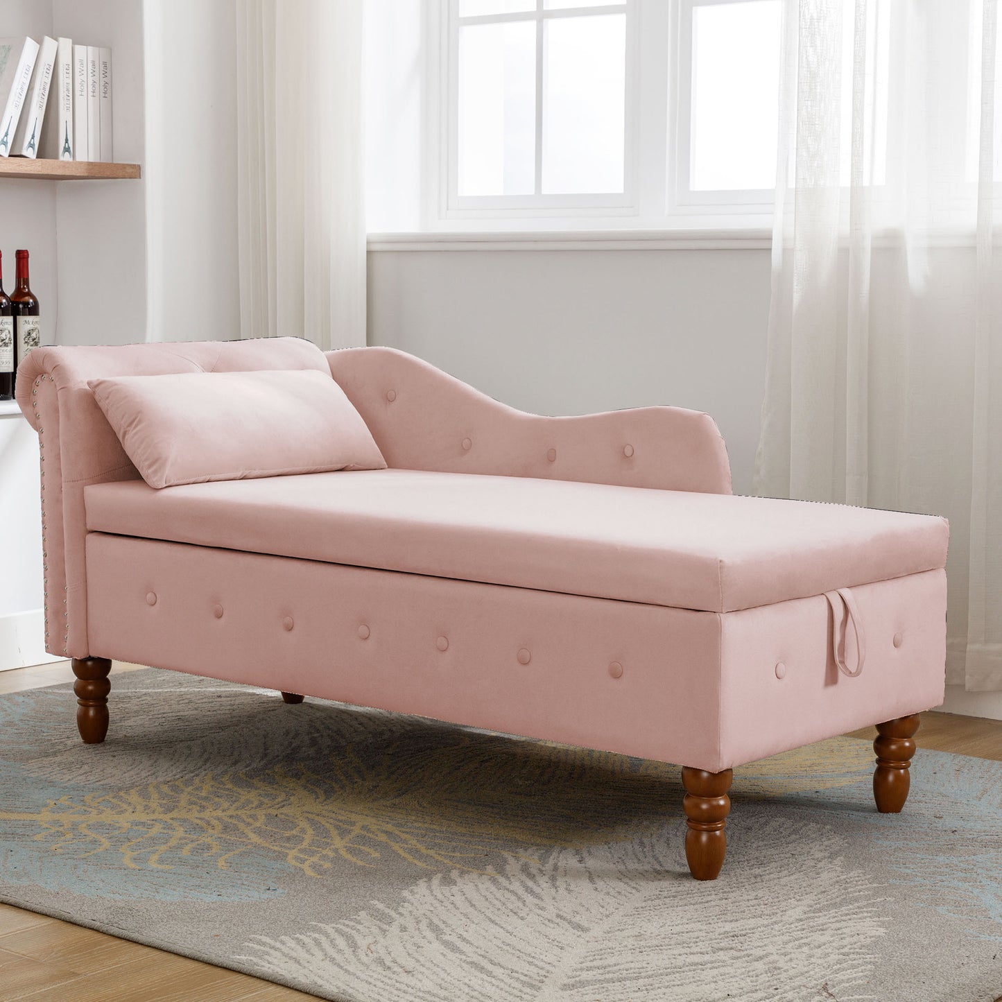 Pink velvet chaise lounge with tufted back and storage