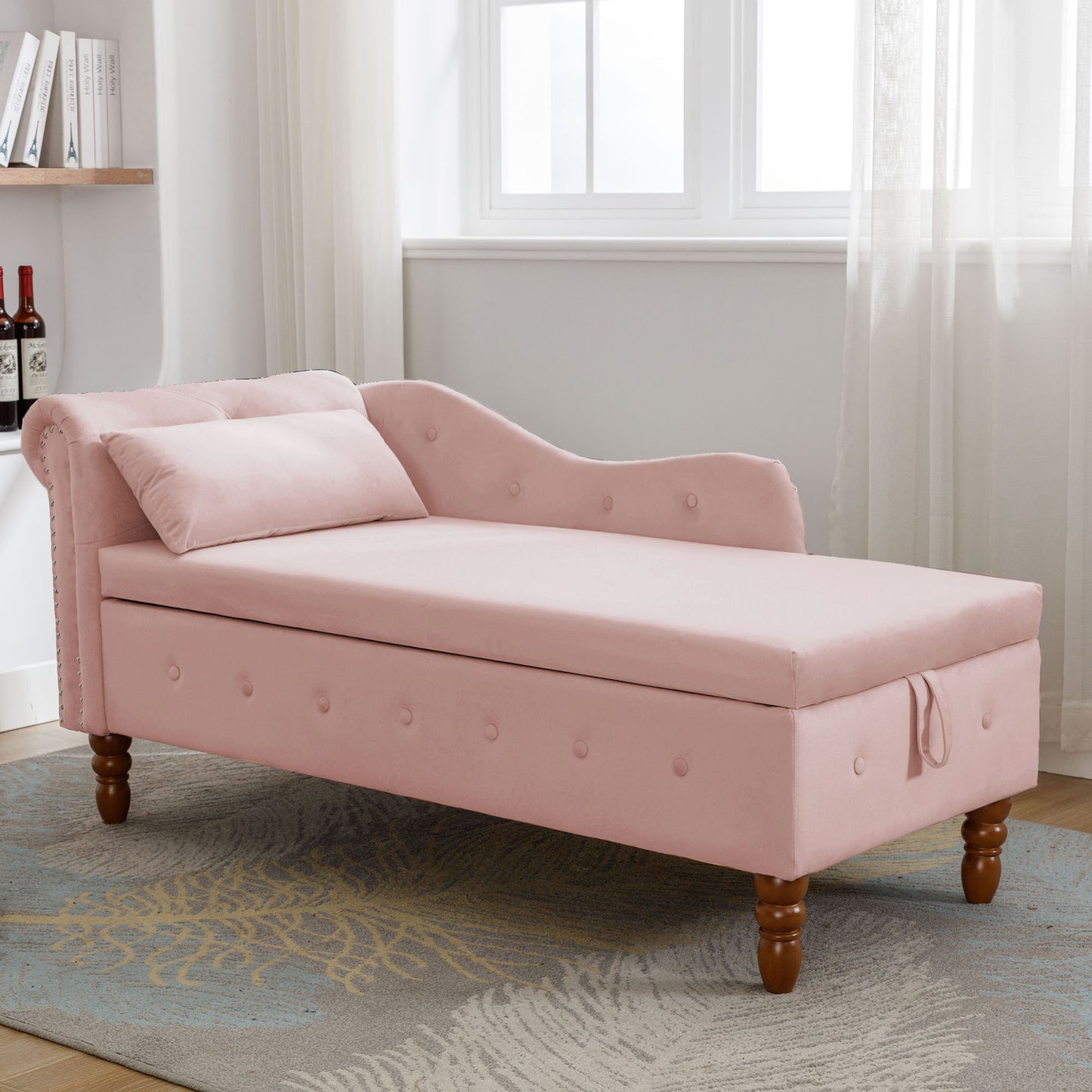 Pink velvet chaise lounge with tufted back and storage