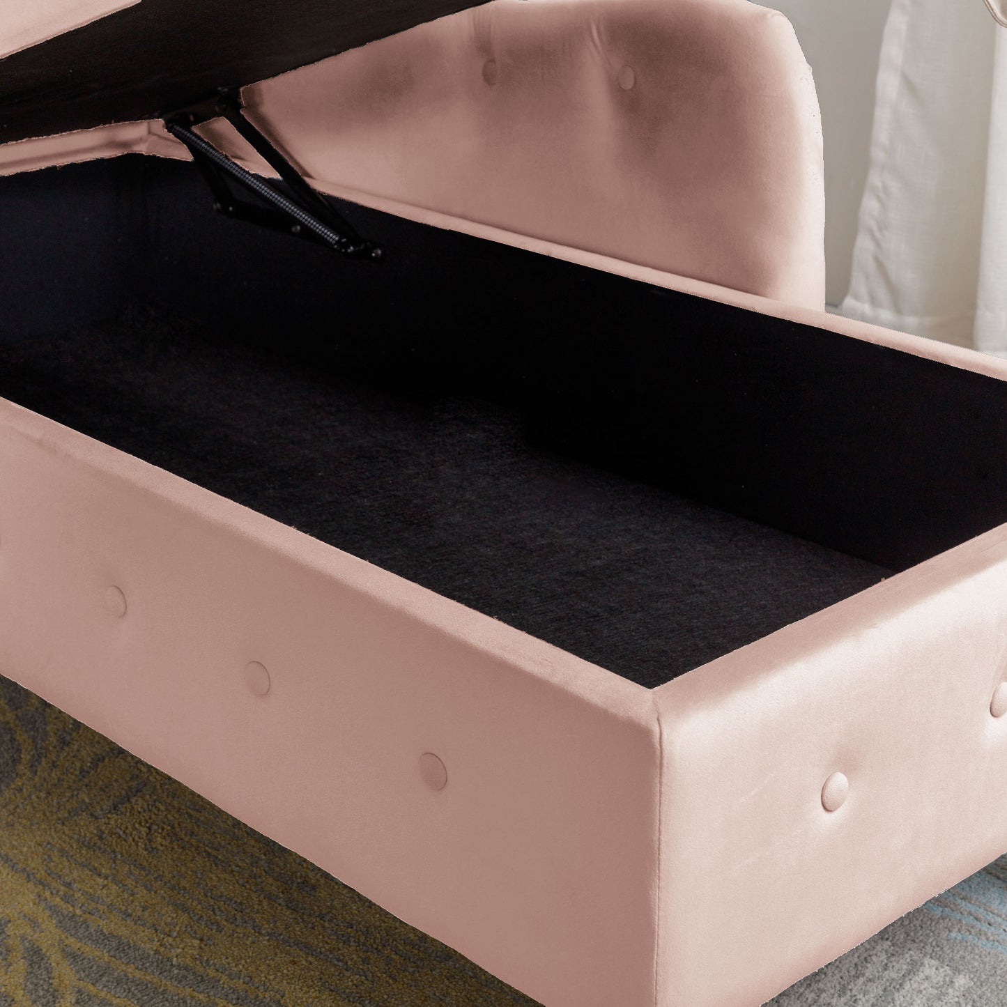 Dusty rose velvet storage ottoman with tufted details and lifttop mechanism