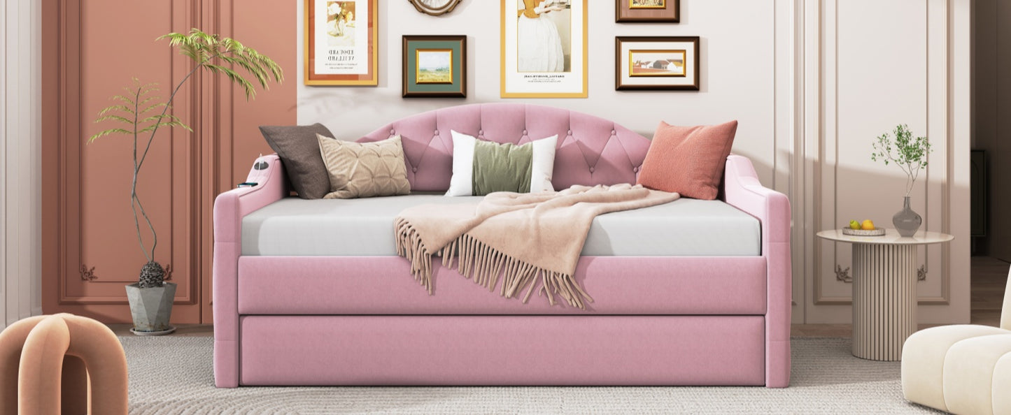 Pink velvet daybed with tufted back and pullout trundle perfect for small spaces
