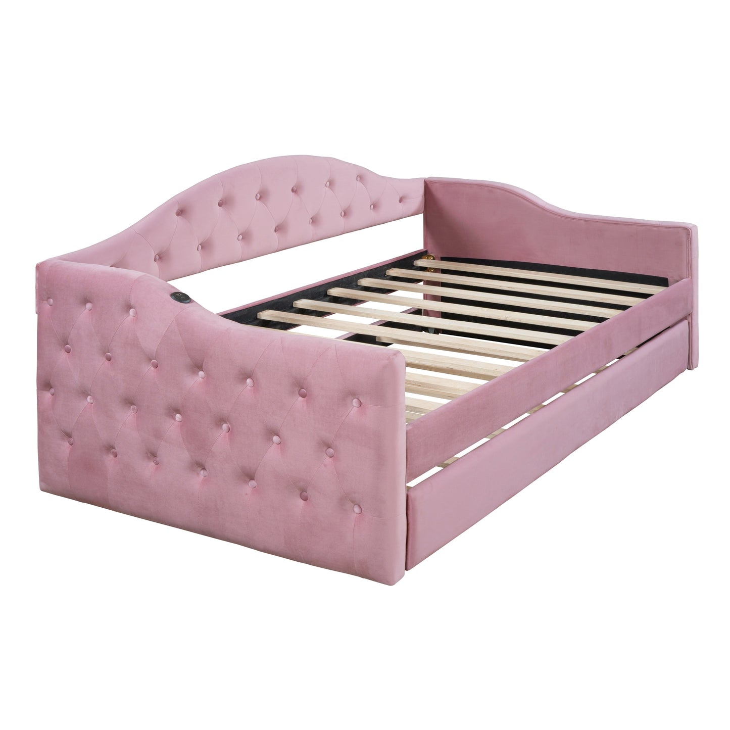Pink velvet daybed with tufted detailing and pullout trundle