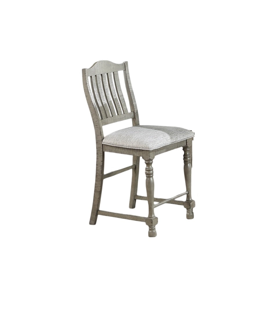 Gray wooden counter stool with a textured light gray fabric seat and slatted back
