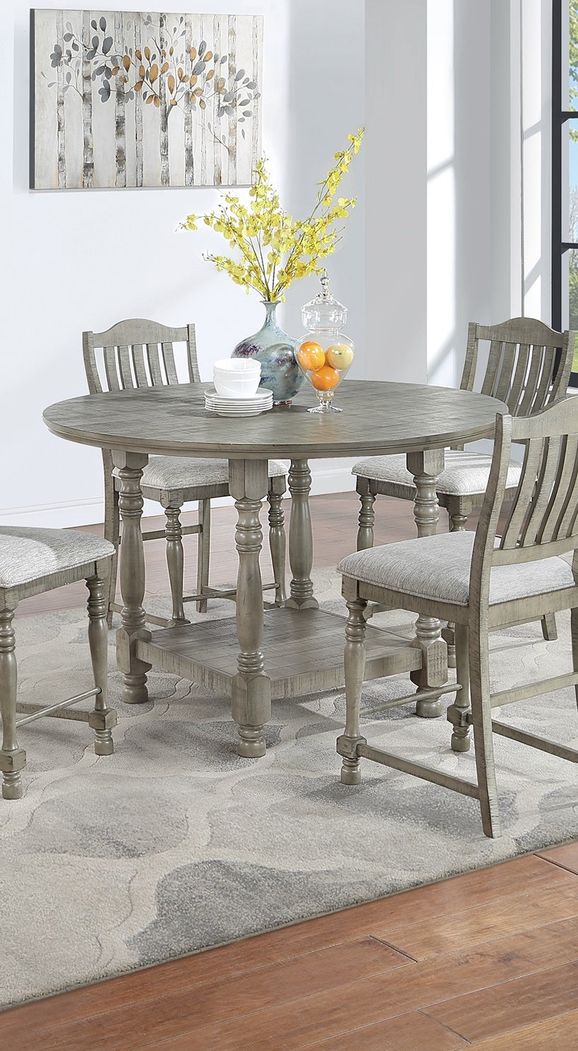 Round grey wood counter height dining table with four upholstered stools