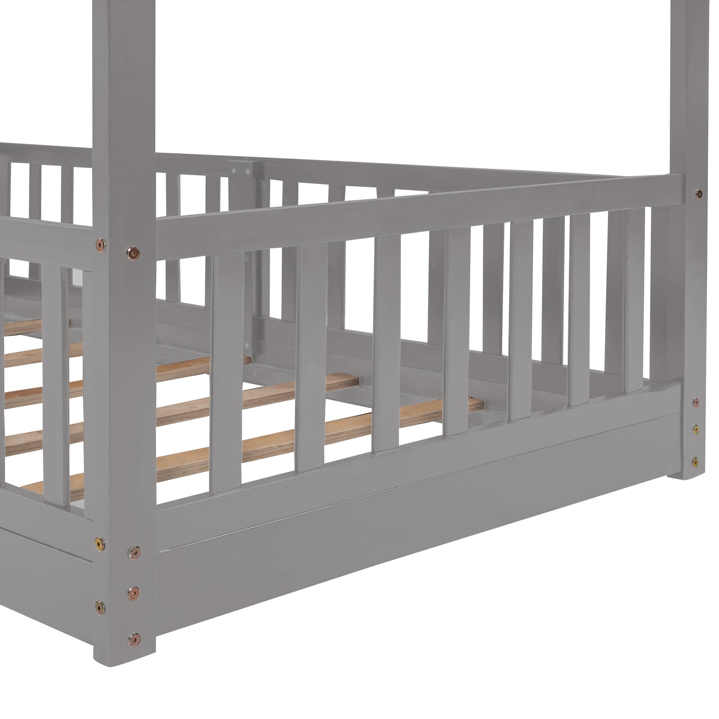 Gray wooden toddler bed frame with safety rails