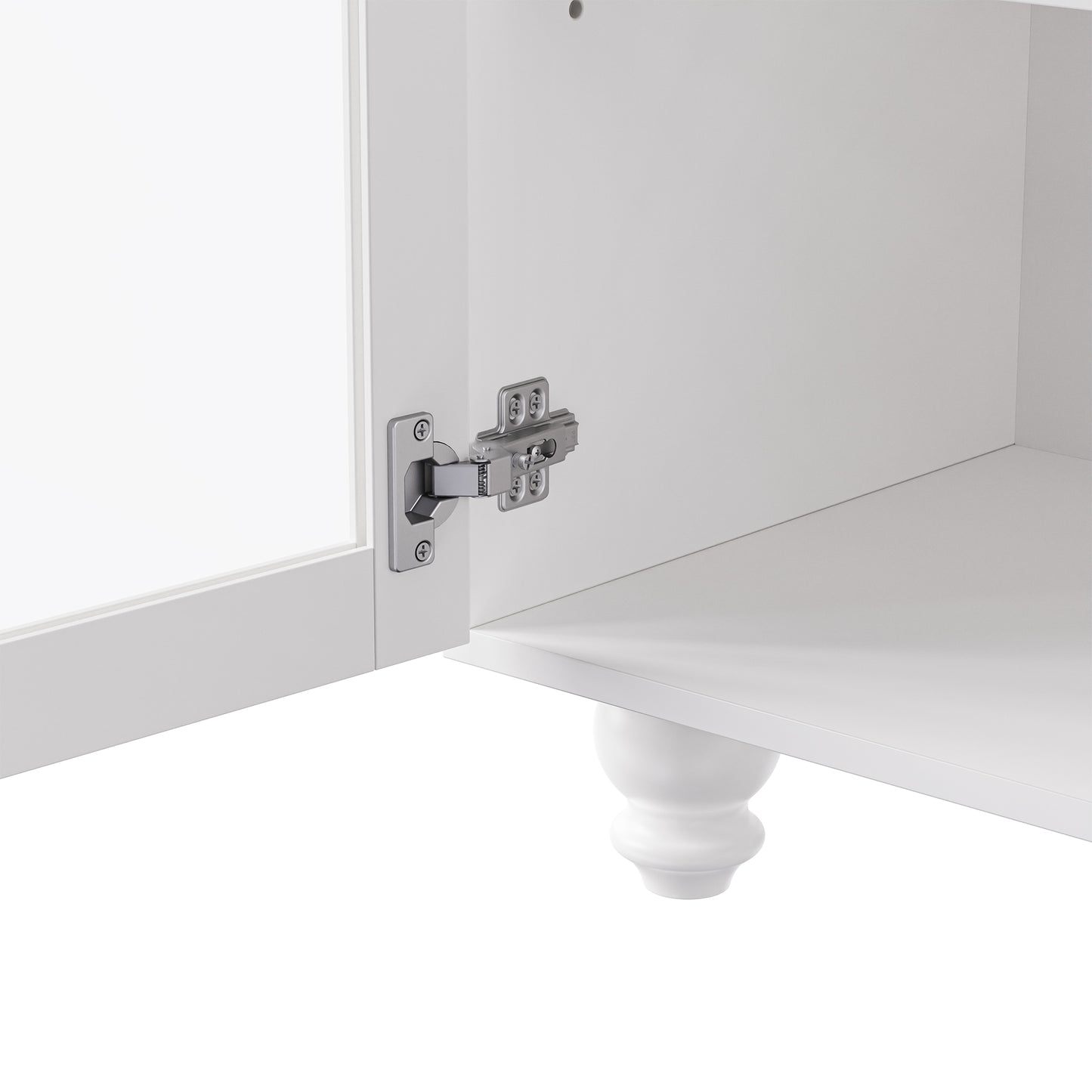 Closeup of white cabinet hinge with silver finish and visible screws