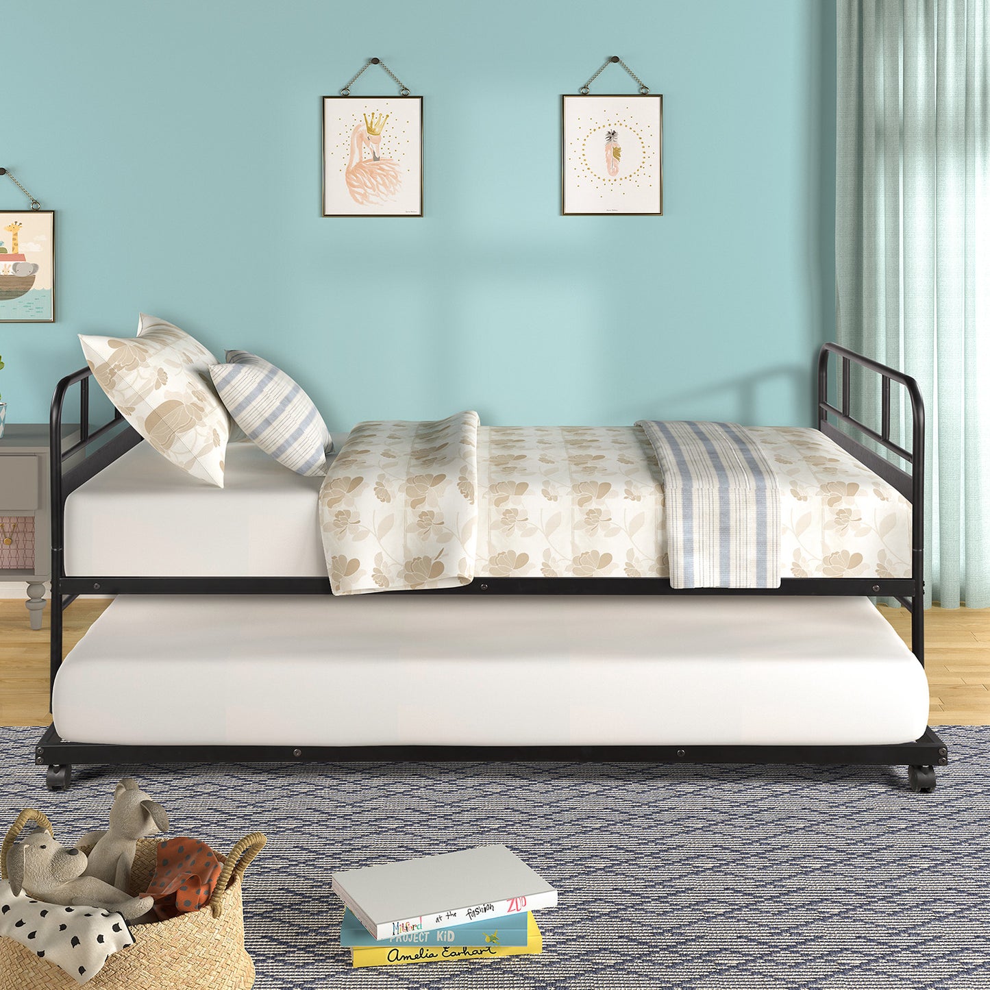 Black metal twin daybed with pullout trundle and floral bedding for kids