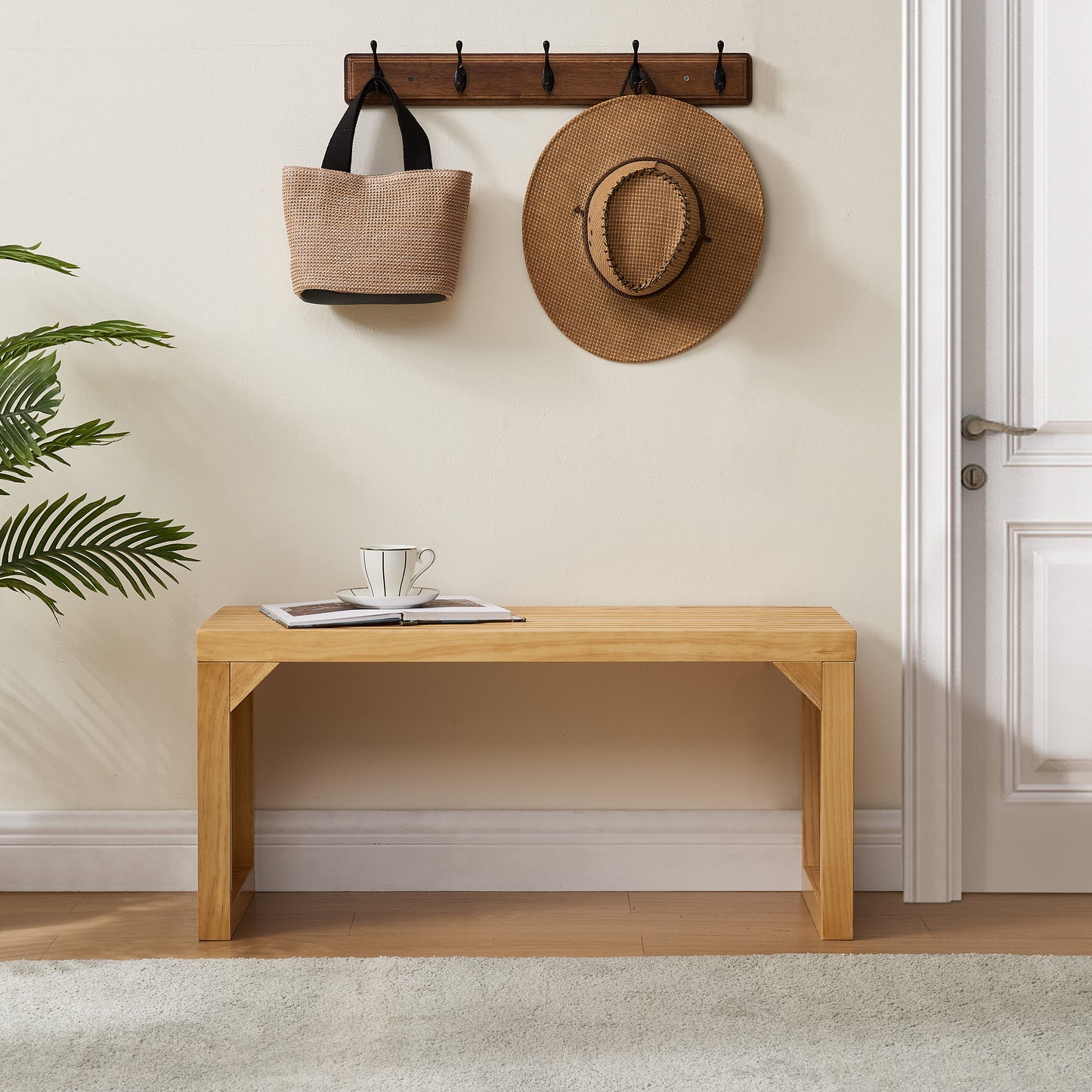 Natural wood entryway bench with minimalist design and clean lines