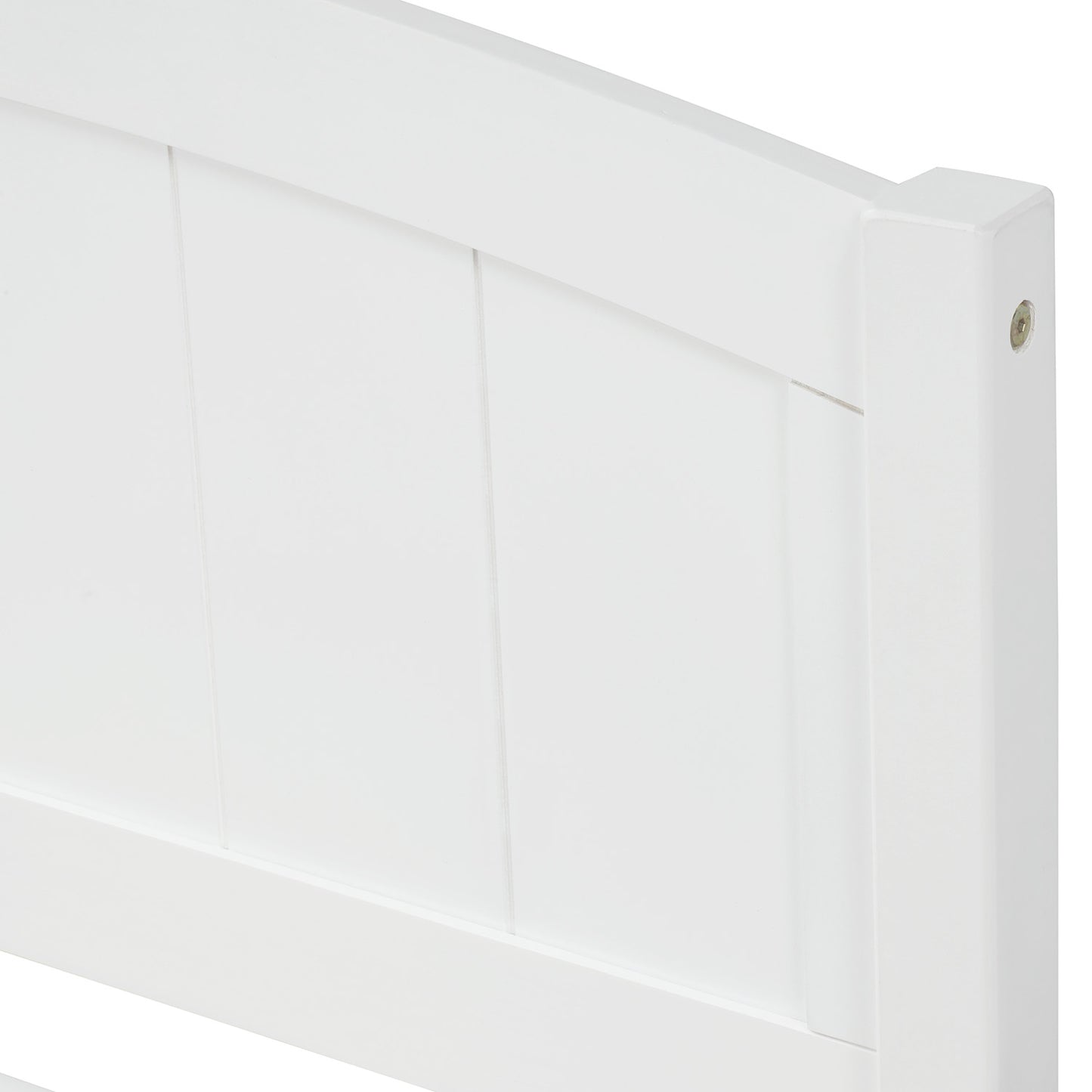 Close up of white wooden headboard with vertical paneling