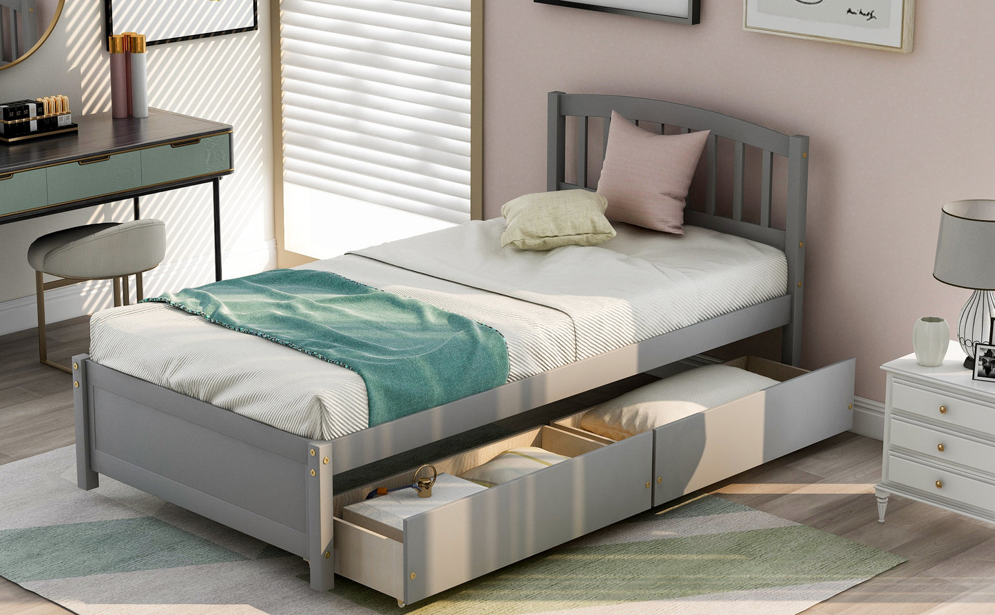 Gray wooden twin bed with pullout drawers and teal throw blanket