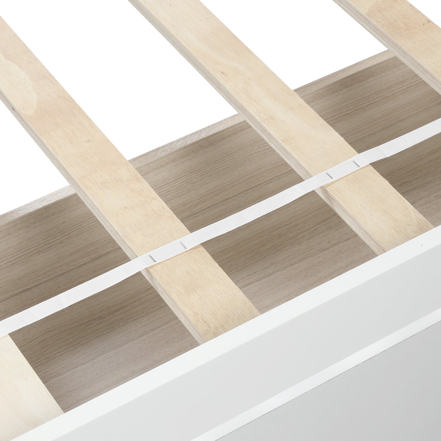 White bed frame detail showing wooden slats and integrated storage