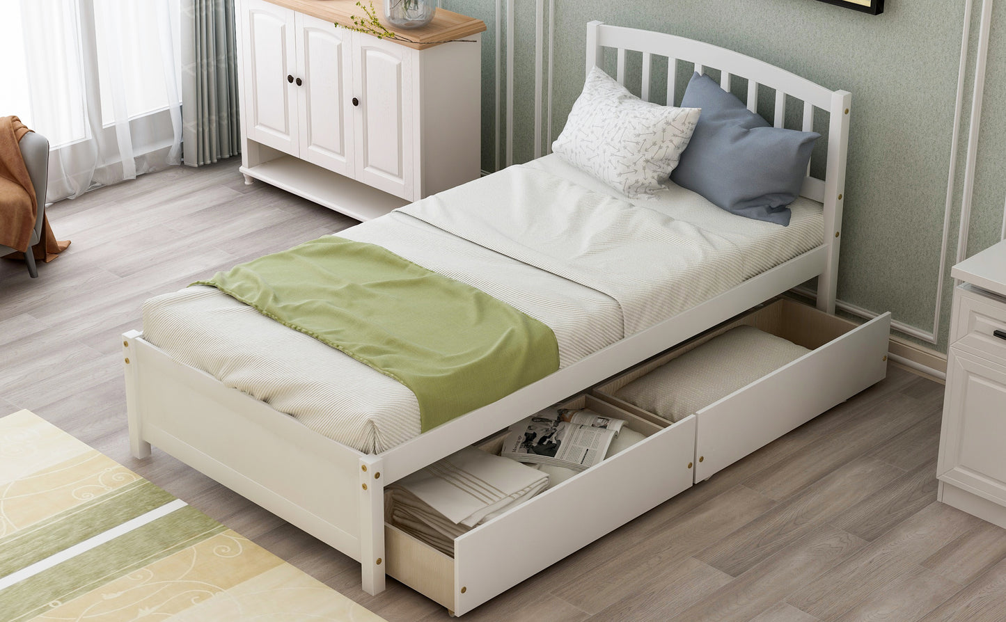 White wooden twin bed with storage drawers perfect for a childs room